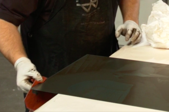 Wiping plate edges with Intaglio Editions